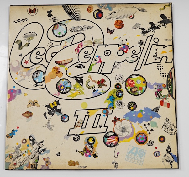 Led Zeppelin; the first three LP record albums, all on red and plum Atlantic labels; Led Zeppelin I (588171), 588171 A1 / 588171 B4, Led Zeppelin II (588198), 588198 A2 / 588198 B2, Led Zeppelin III (2401002), 2401002 A5